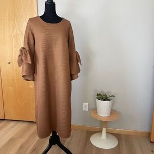 Elegant Brown Textured Dress

Dorma’s Couture 
REASONABLE OFFERS ACCEPTED